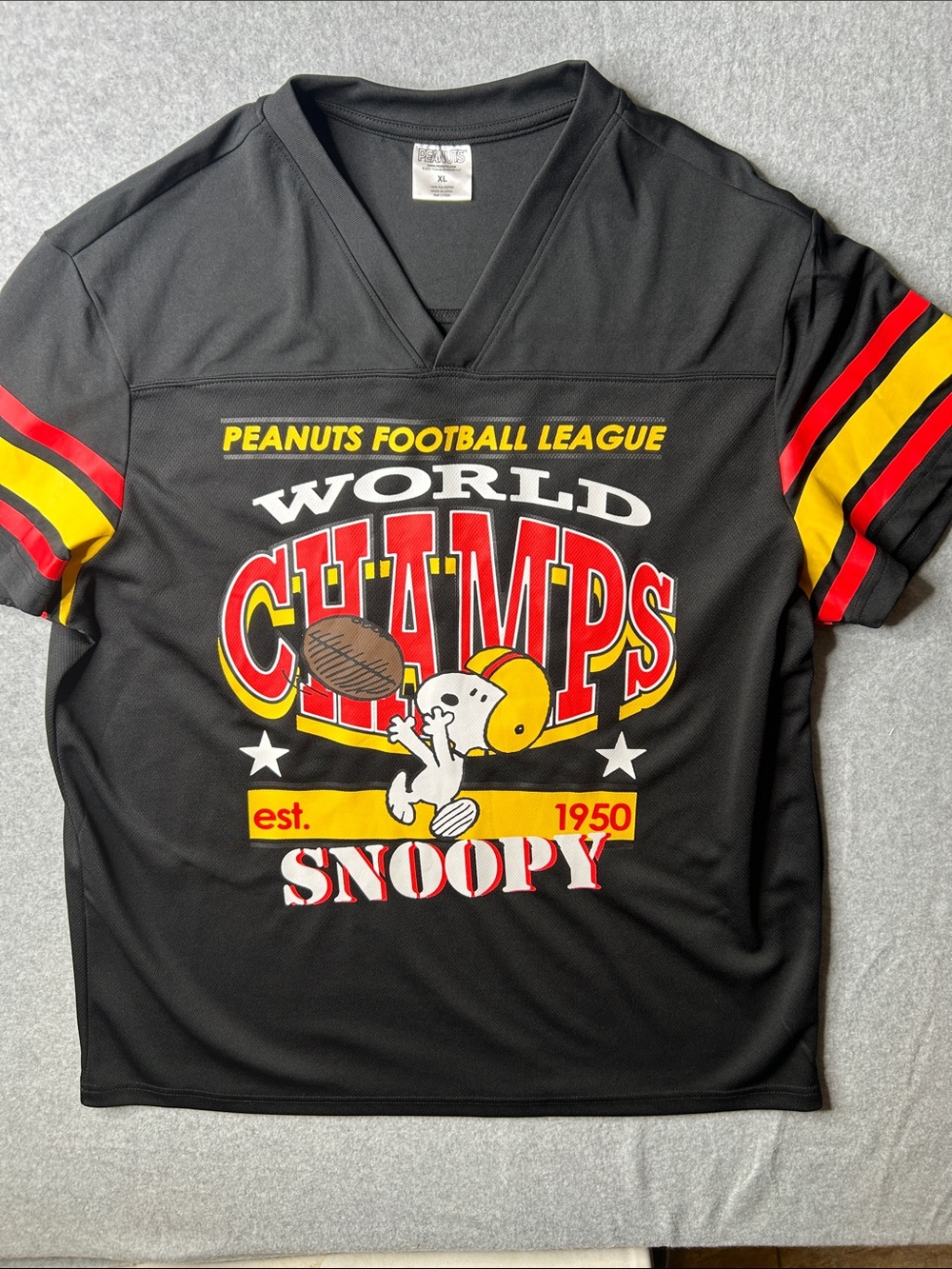 Peanuts Black Snoopy "World Champs" Football Jersey with Red & Yellow Accents